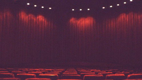 view of the curtains covering the giant 108 foot wide/35 foot high curved Cinerama screen at Omaha's former Indian Hills Theatre.