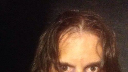 Me in makeup and costume as a voyeuristic serial killer in a trailer for Asgard Film Studios in San Antonio, Texas