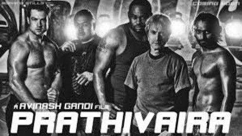 On set photo of Fight Action's stunt fighter team posing with lead actor Prim for the film &quot;Prathivaira.&quot; From Left: Curt Cotton, Charles Maxwell (deceased), Big Spence, Durand Garcia, Prim. Not shown: Daniel Hernandez.