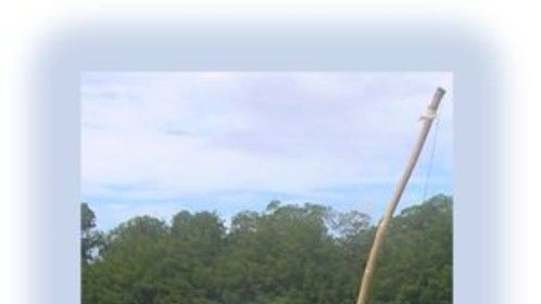 Playing the berimbau on the shores of the Rio Jacuipe