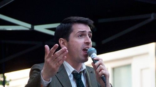 Performing as compere of the Entertainment stage in Soho, London.