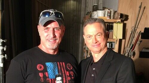 Wore a Joe Mantegna tee shirt to show where Gary Sinise is #1 on the call sheet. 