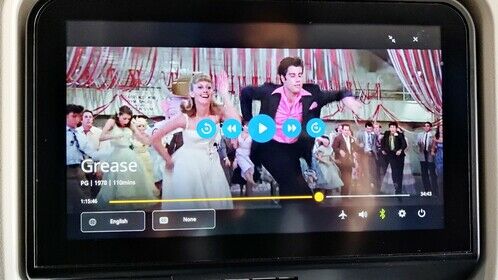 Classic movies during the flight! #Grease ✈️
