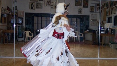 Shaman - I made about a dozen of these for HILTI Corporation in 2004
Leather, velvet, bones, beads, feathers, furs, cotton, buffalo horns...  This is taken in our dance studio - I am modeling the costume which was made for a man much taller than I.